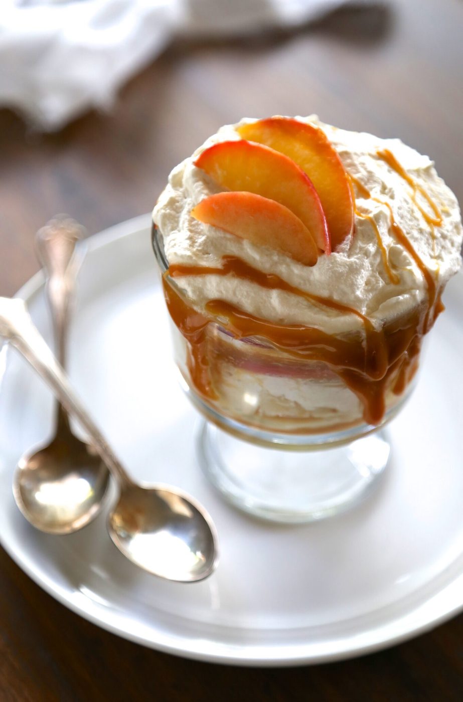 Apple trifle, finished with bourbon whipped cream + caramel drizzle