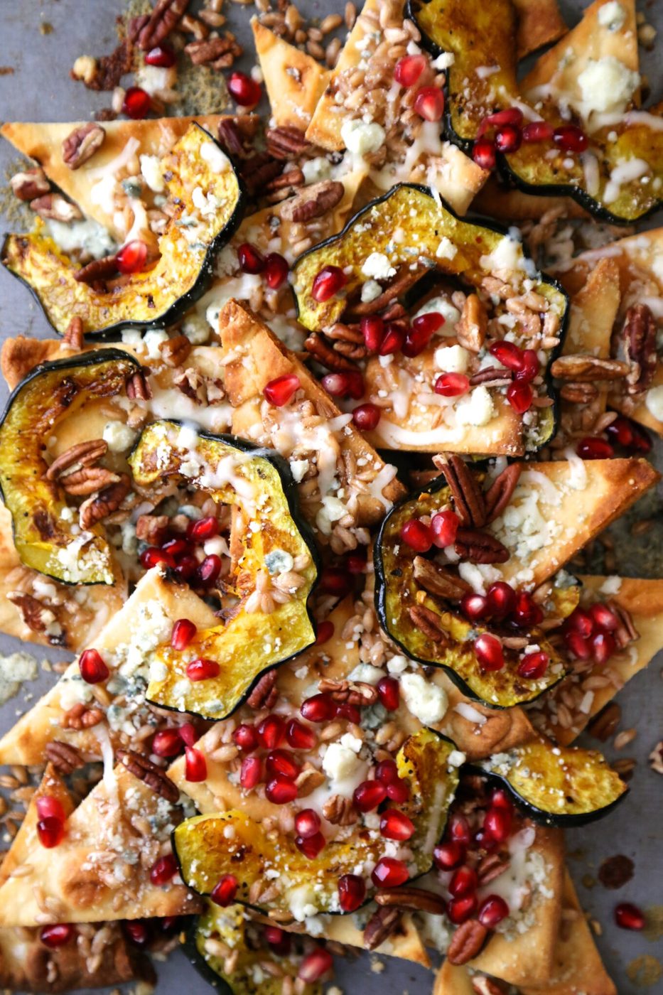 Autumn acorn squash pita “nachos”, finished with pomegranates & blue cheese