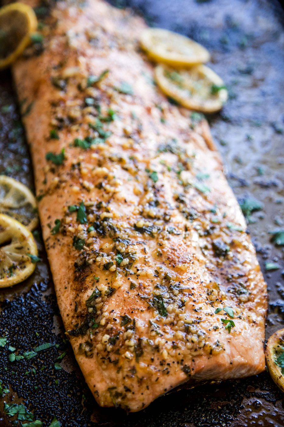 Baked Cajun Parmesan Salmon on a sheet pan.
