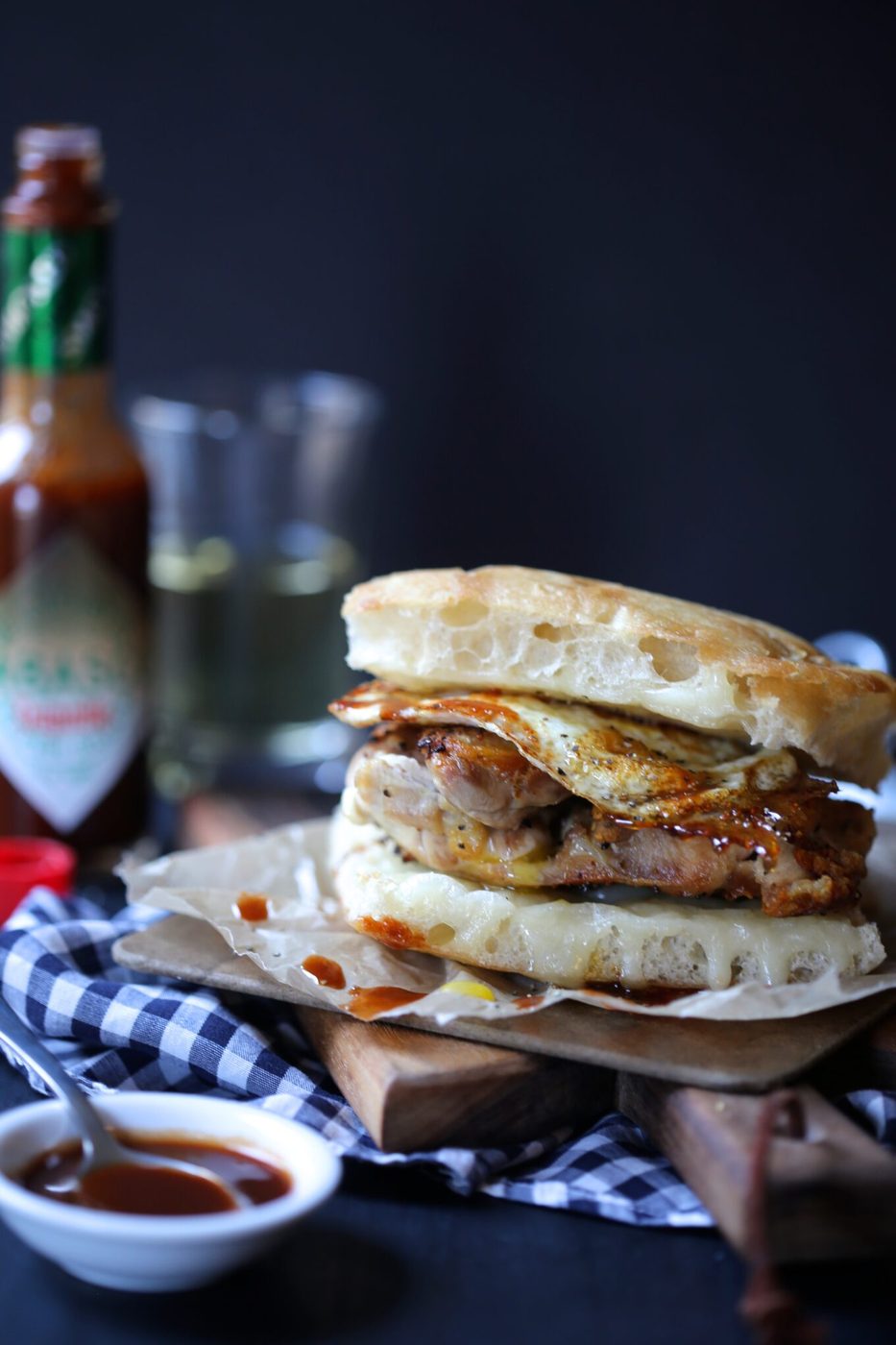 Crispy chicken slider, finished with fried egg & chipotle tabasco