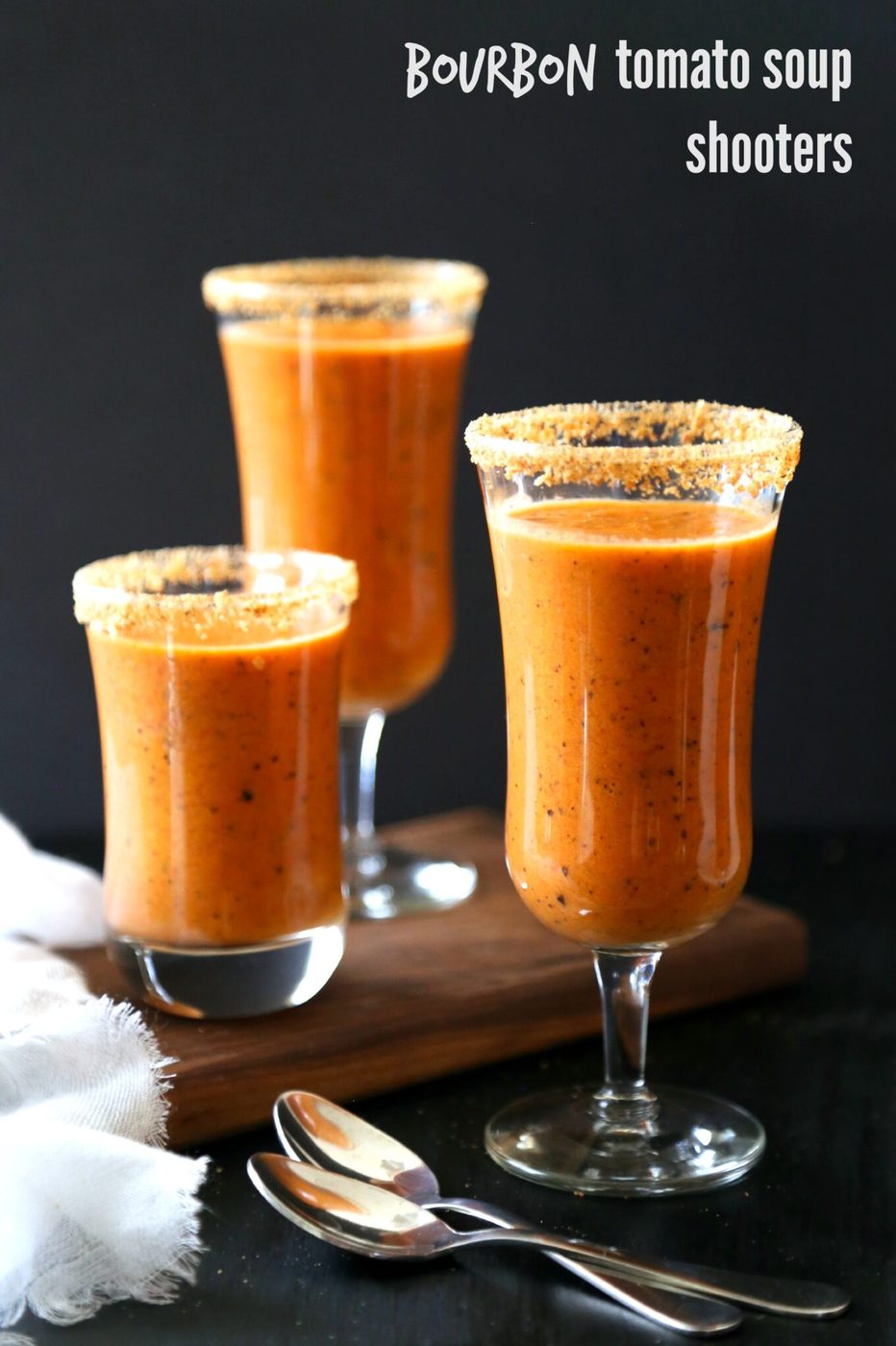 Bourbon tomato soup shooters, finished with grilled cheese rims