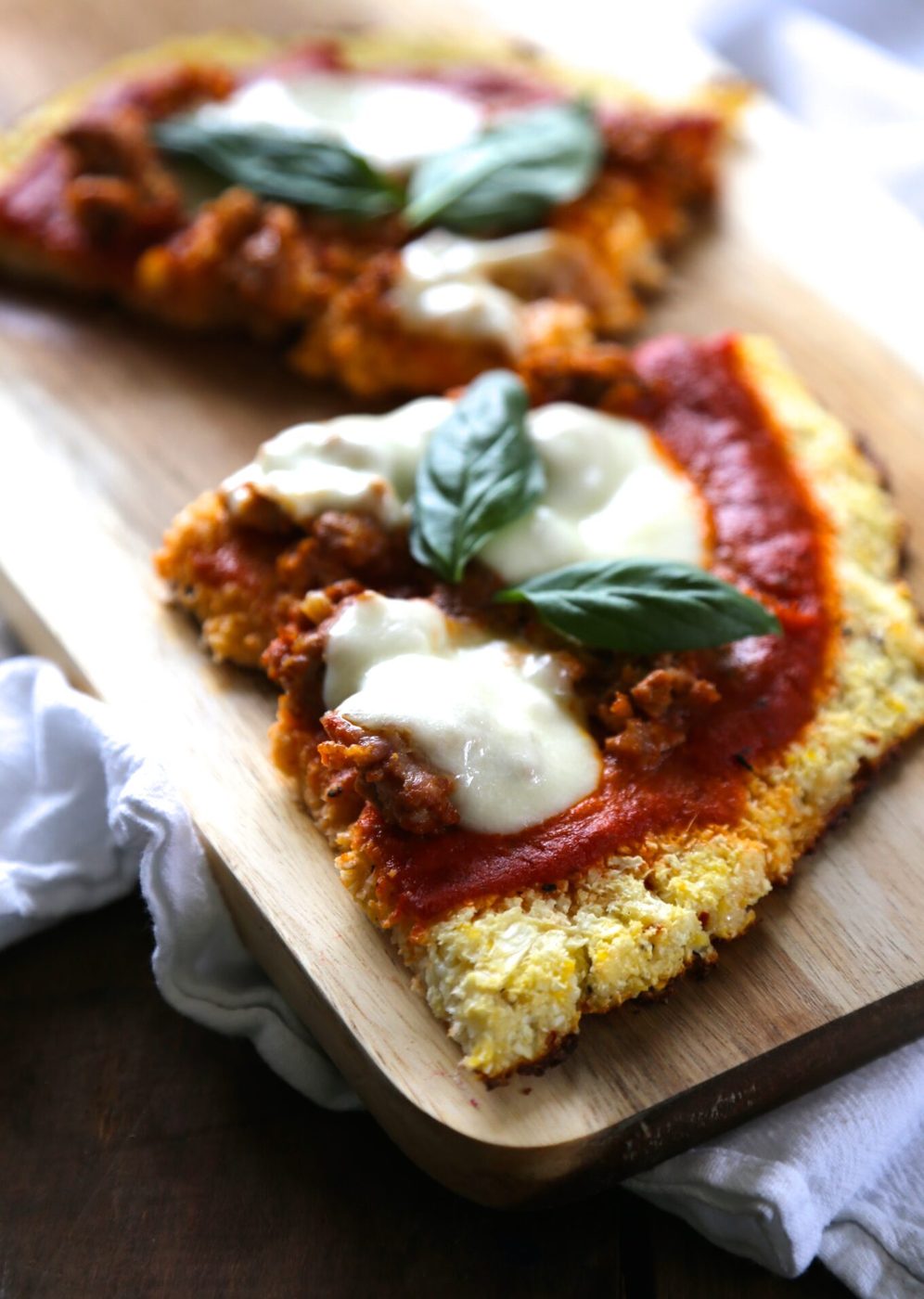 Cauliflower pizza crust, finished with chorizo & buffalo mozzarella