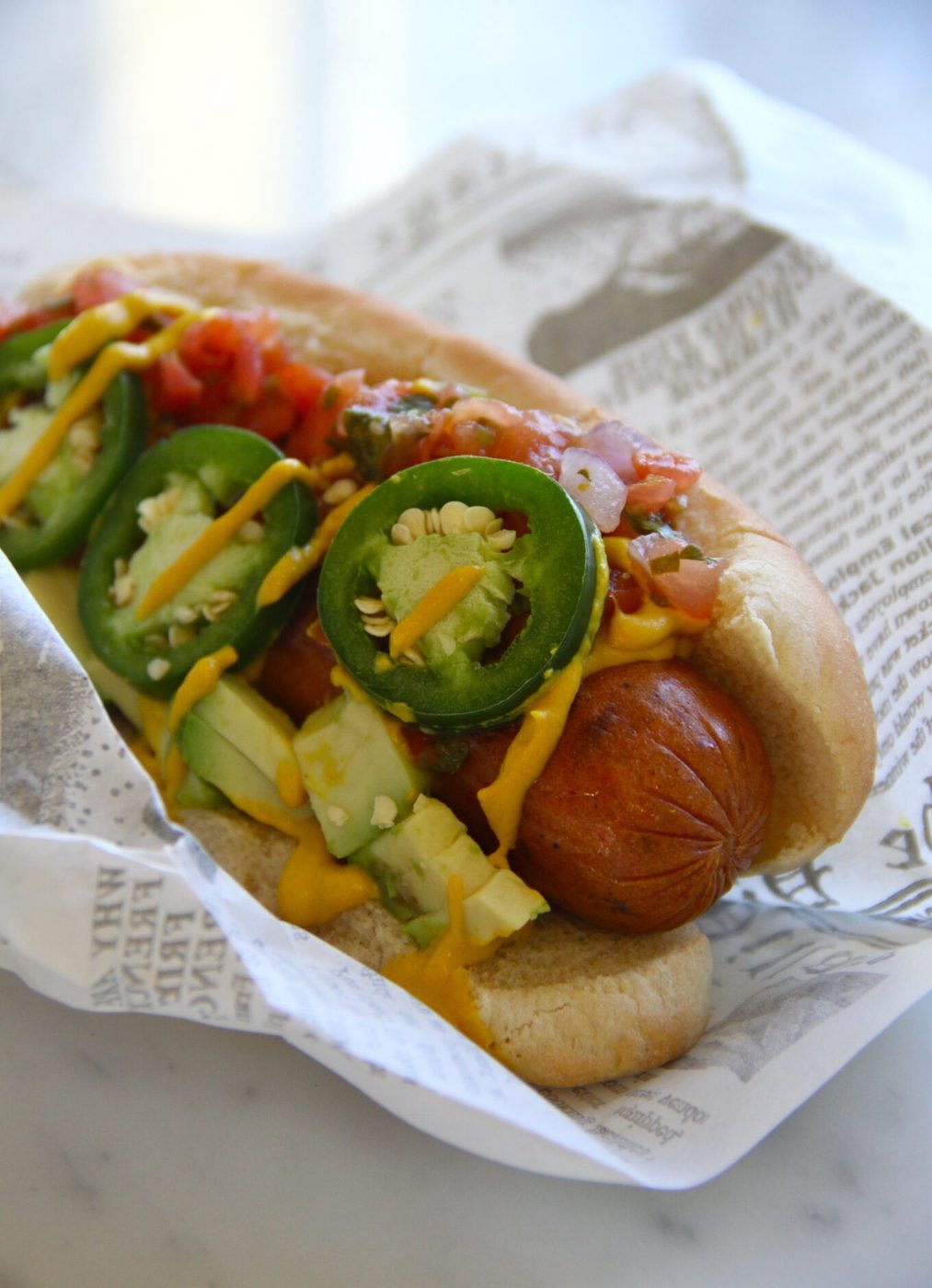 Avocados and japlapenos {a.k.a. the t.j.} on chicken andouille brats