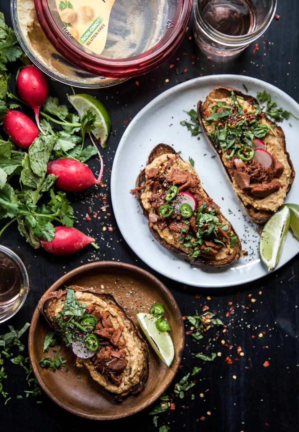 Fresh Herbs on chipotle Hummus Jackfruit Toast