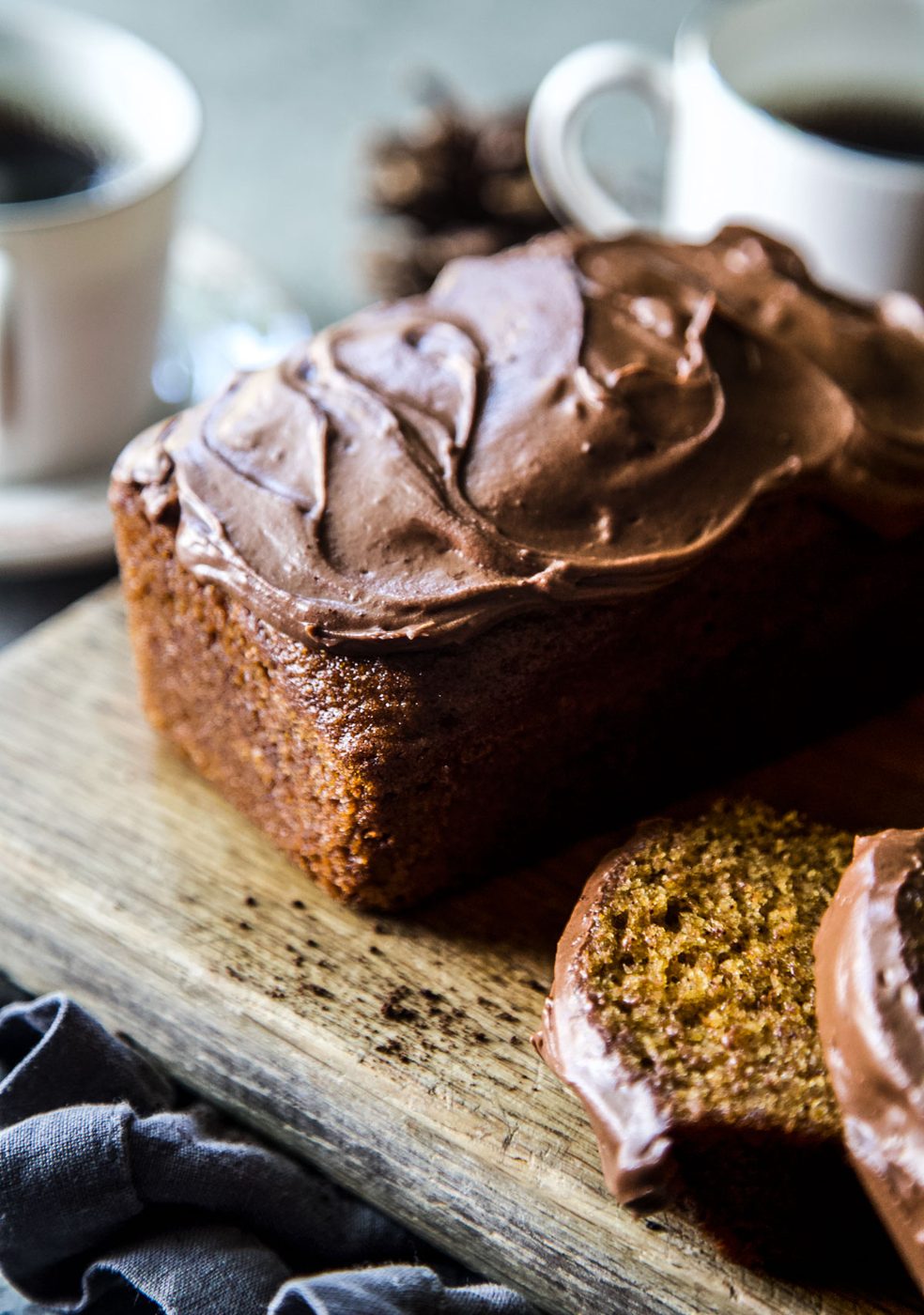 Chocolate Frosted Pumpkin Bread in this Chocolate Frosted Pumpkin Bread?/h2pWhen it comes to making pumpkin bread you want the bread to actually taste like pumpkin. Am we right? The reason why we love this recipe is because it uses up an entire can of pumpkin puree. Can we get a high-five? No more third there or a quarter cup here. We are making a pumpkin bread that tastes like pumpkin. Okay, for this recipe you will need:/pul liAll-purpose flour/li liBaking soda/li liGround cinnamon/li liGround nutmeg/li liGranulated sugar/li liBrown Sugar/li liVegetable oil/li liEggs/li liWHOLE CAN OF PUMPKIN!/li liUnsalted butter/li liPowdered sugar/li liCocoa powder/li liMilk/li liEspresso coffee powder/li liVanilla extract/li /ulfigureimg src=