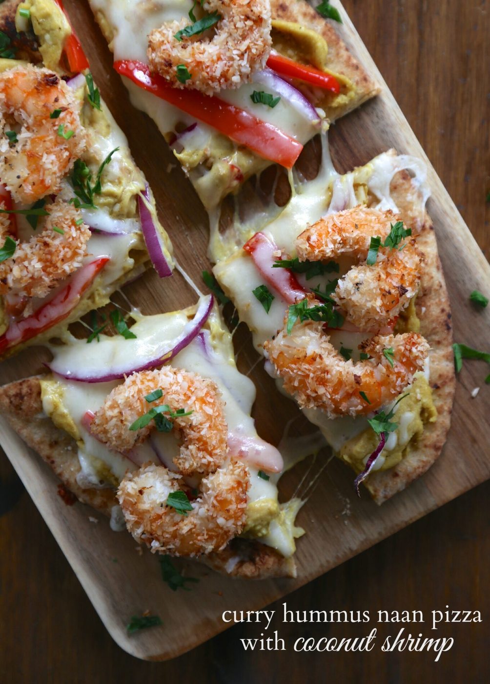 Coconut shrimp on curry hummus naan pizza