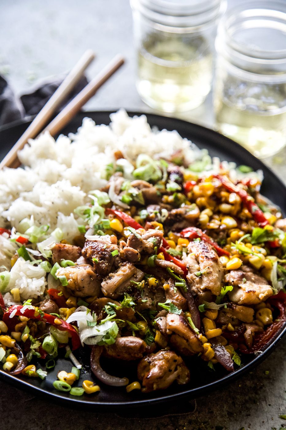 Simple Chicken & Corn Stir-Fry in this Simple Chicken & Corn Stir-Fry?/h2pWhen it comes to weeknight meals, you need something speedy, fast, and in a hurry. This Simple Chicken & Corn Stir-Fry will meet your needs in terms of nourishment, but still packs a lot of flavor. You will need: /pul liChicken thighs/li liFresh or frozen corn/li liOyster sauce/li liToasted Sesame Oil/li liRice Vinegar/li liRed Onion/li liRed Bell Pepper/li liRice/li /ulfigureimg src=