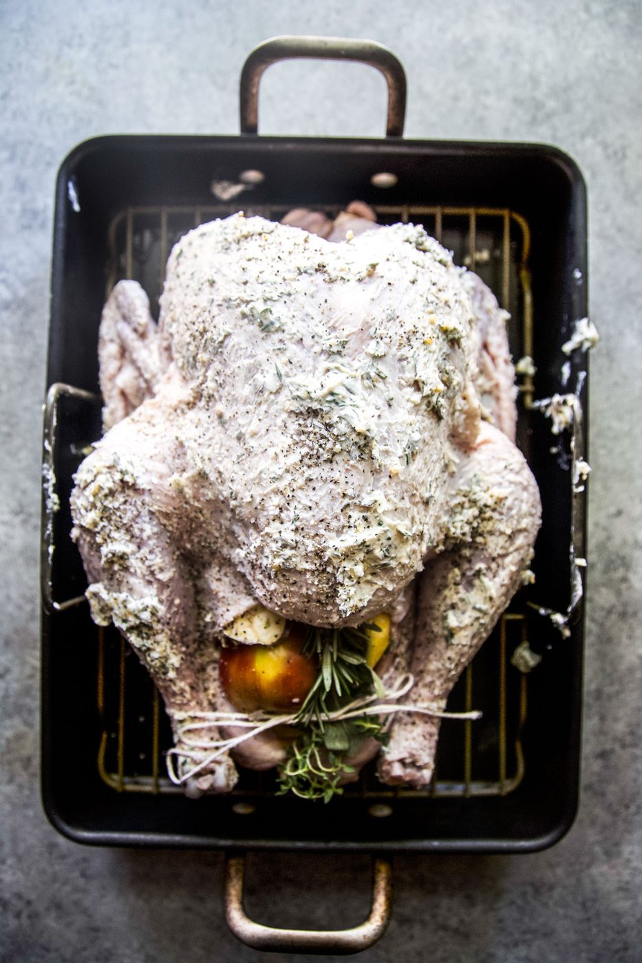 turkey stuffed with lemon, apple, garlic, onion and rubbed with herb butter