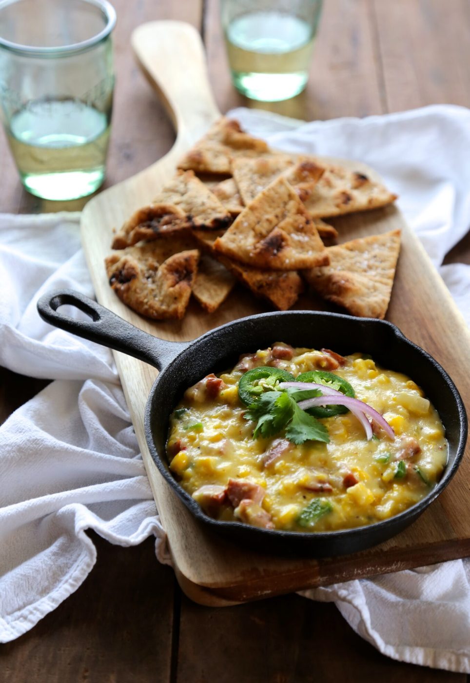 Foodie fridays: cajun corn poblano queso, finished with naan chips