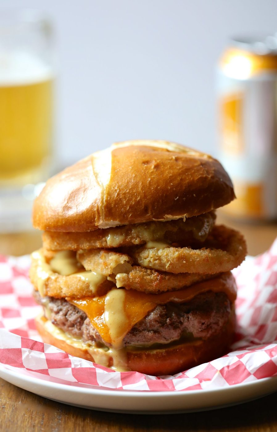 Foodie fridays: juicy ball park burger, finished with onion rings & mustard beer sauce