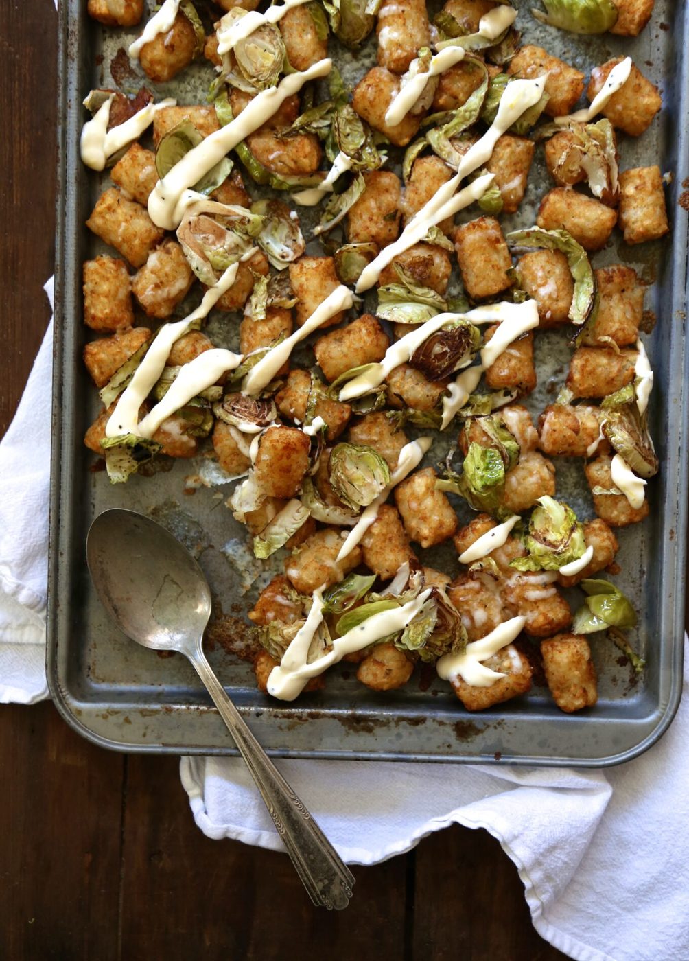 Foodie fridays: roasted brussel sprout totchos, finished with lemon aioli