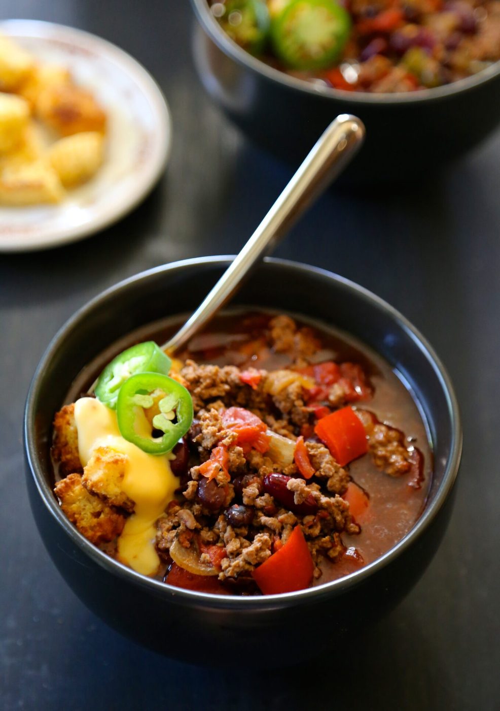 Foodie fridays: slow cooker tijuana chili, finished with jalapeno cornbread croutons & queso