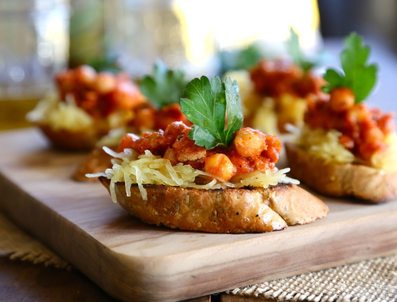 Chorizo & chickpeas on foodie fridays: spiced spaghetti squash crostini