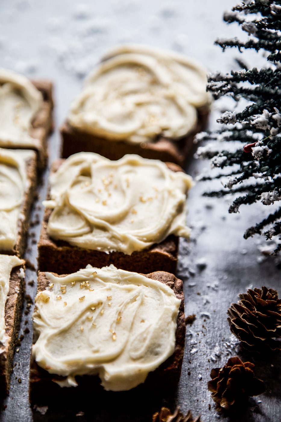 Gingerbread Cookie Bars with Caramel Frosting on a table