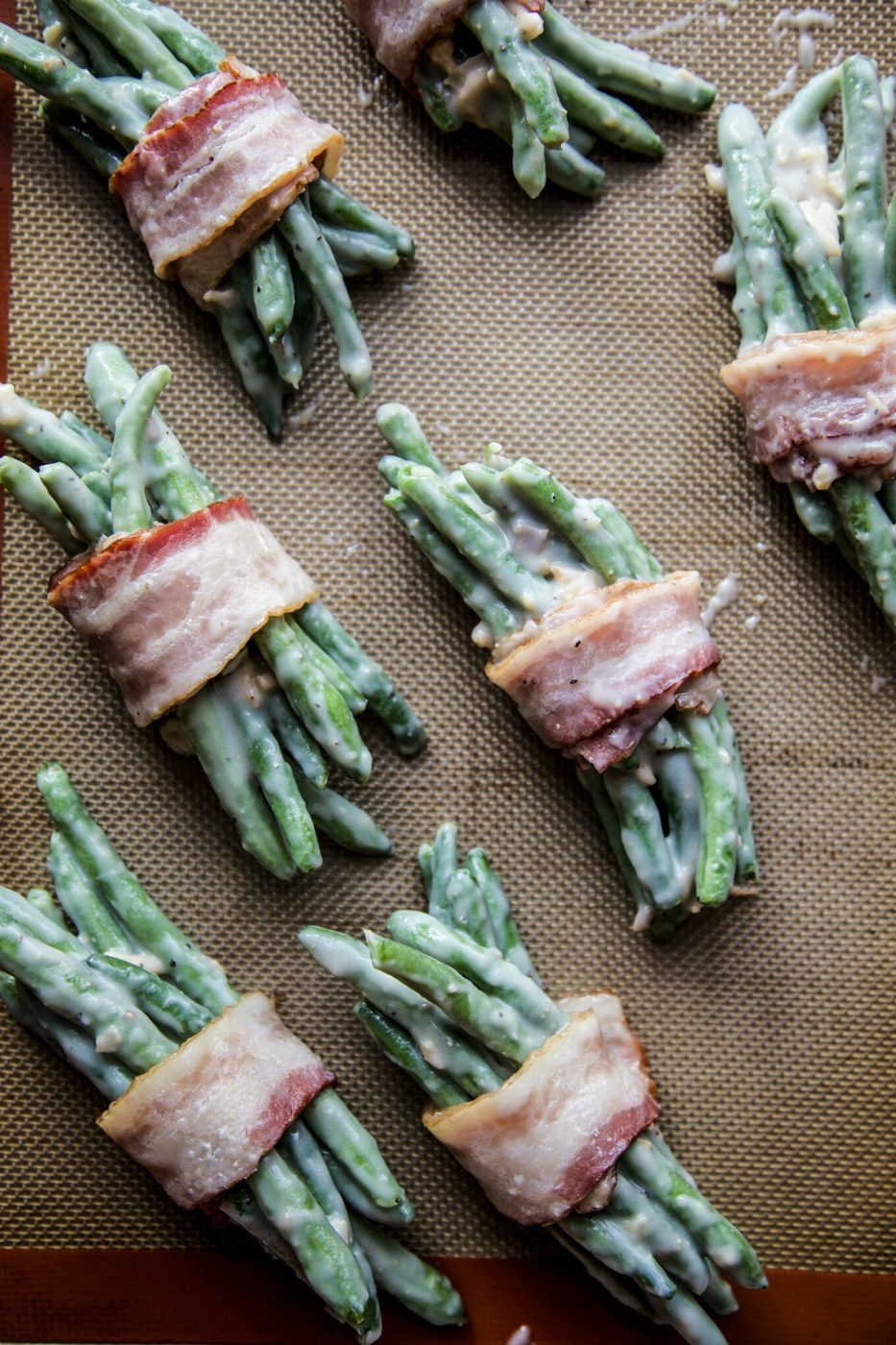 green bean bundles before being baked