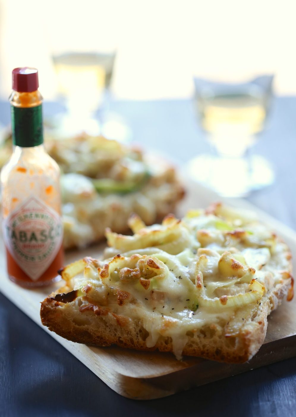 Honey caramelized fennel & tabasco on grilled chicken flatbread