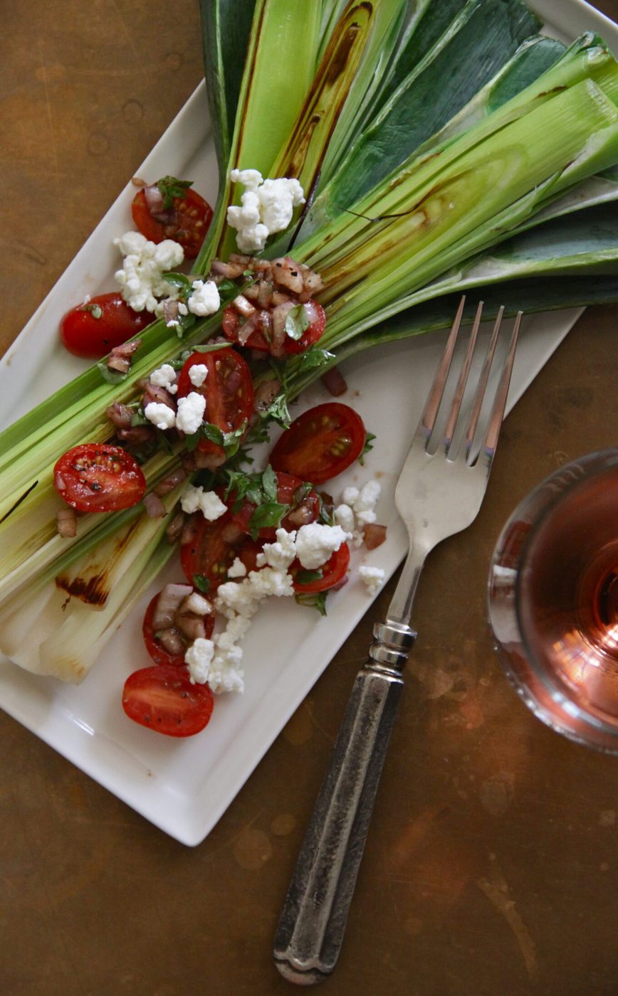 Grilled leeks, finished with garden tomatoes and fresh basil