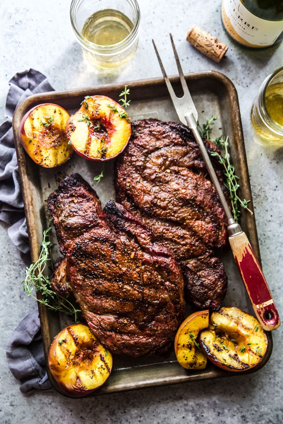 Grilled Ribeye Steaks, finished with Peaches