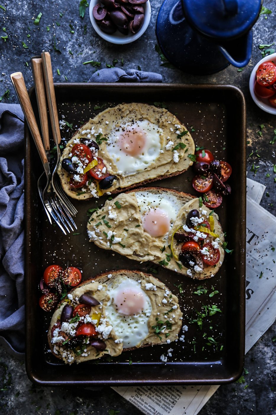 Mediterranean Egg-in-a-Hole Toast, finished with Hummus