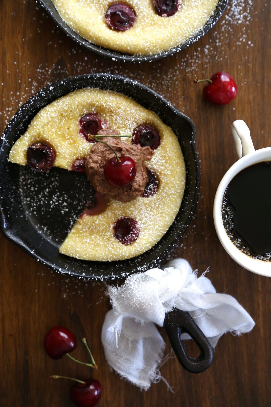 Chocolate whipped cream on mini cherry clafoutis