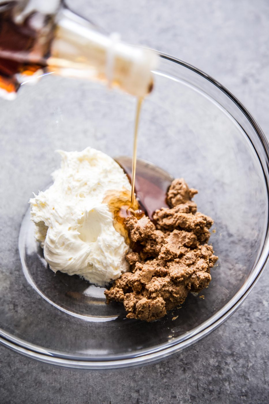 whipped cream, nut butter, and mape syrup in a bowl