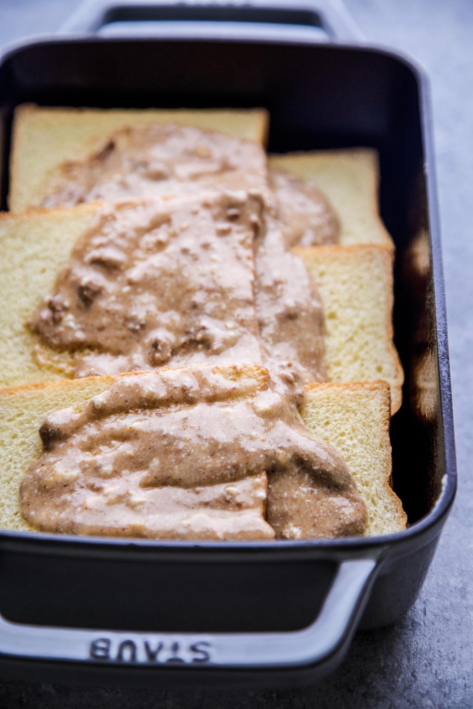 nut butter mixture poured over brioche bread