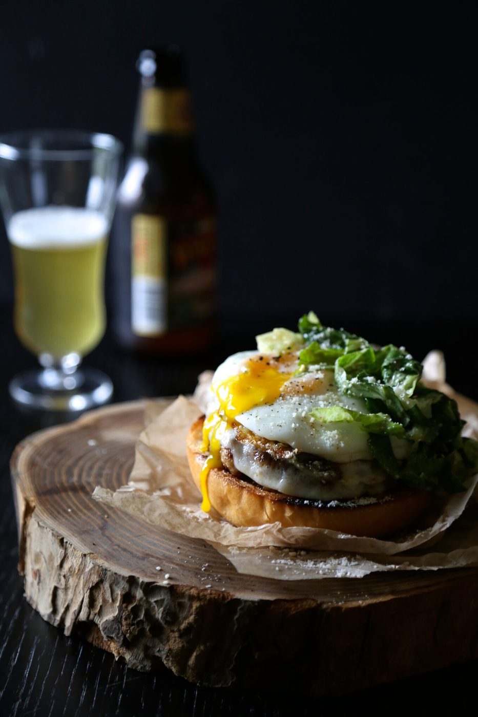 Balsamic caesar dressing on open-faced parmesan chicken burger