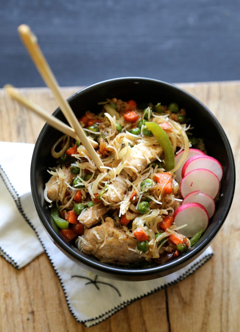 Orange sesame pork noodle bowl
