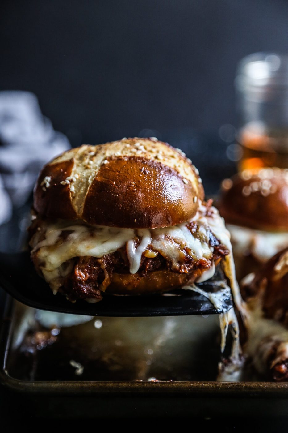 Beer Cheese Sauce on oven Baked Pulled Pork Sliders