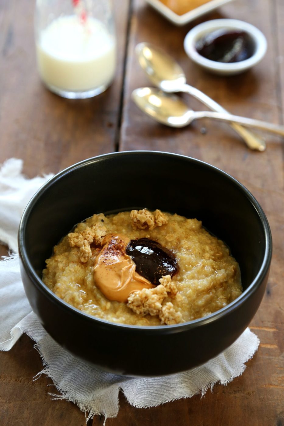 Peanut butter and jelly porridge, finished with chunky granola