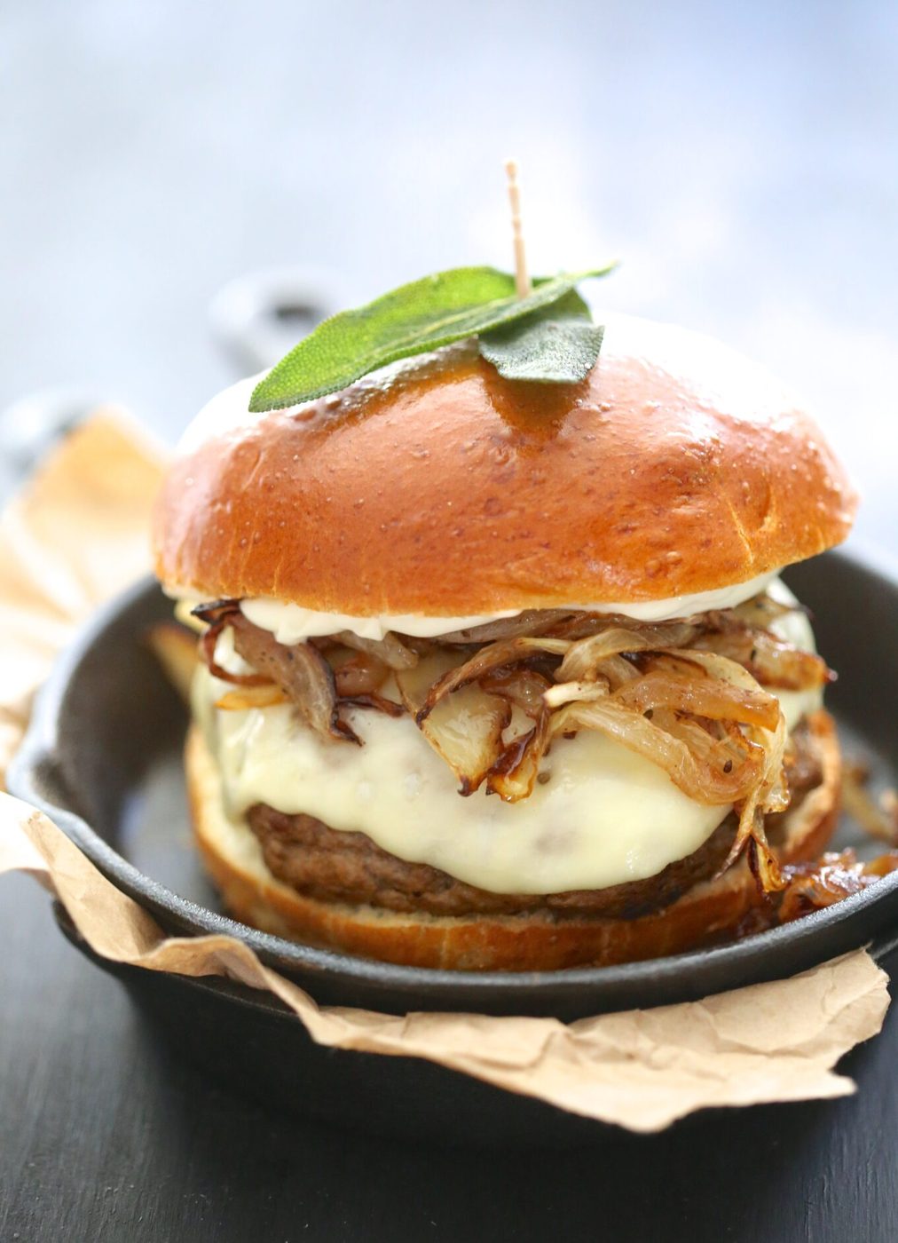 Fried sage on pumpkin swiss burger