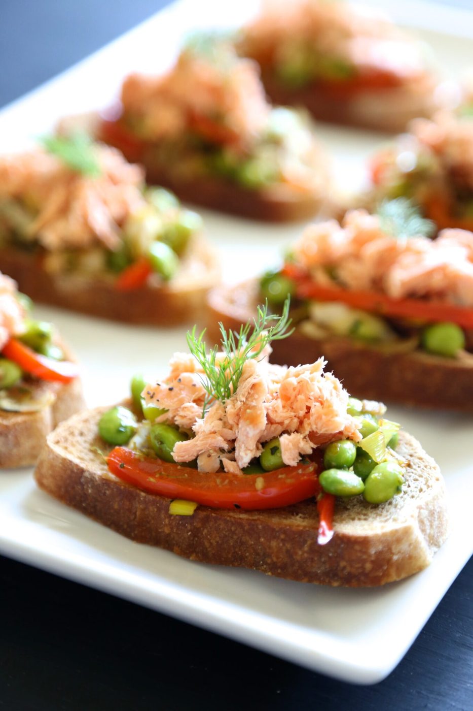 Fava bean ragout on salmon crostini