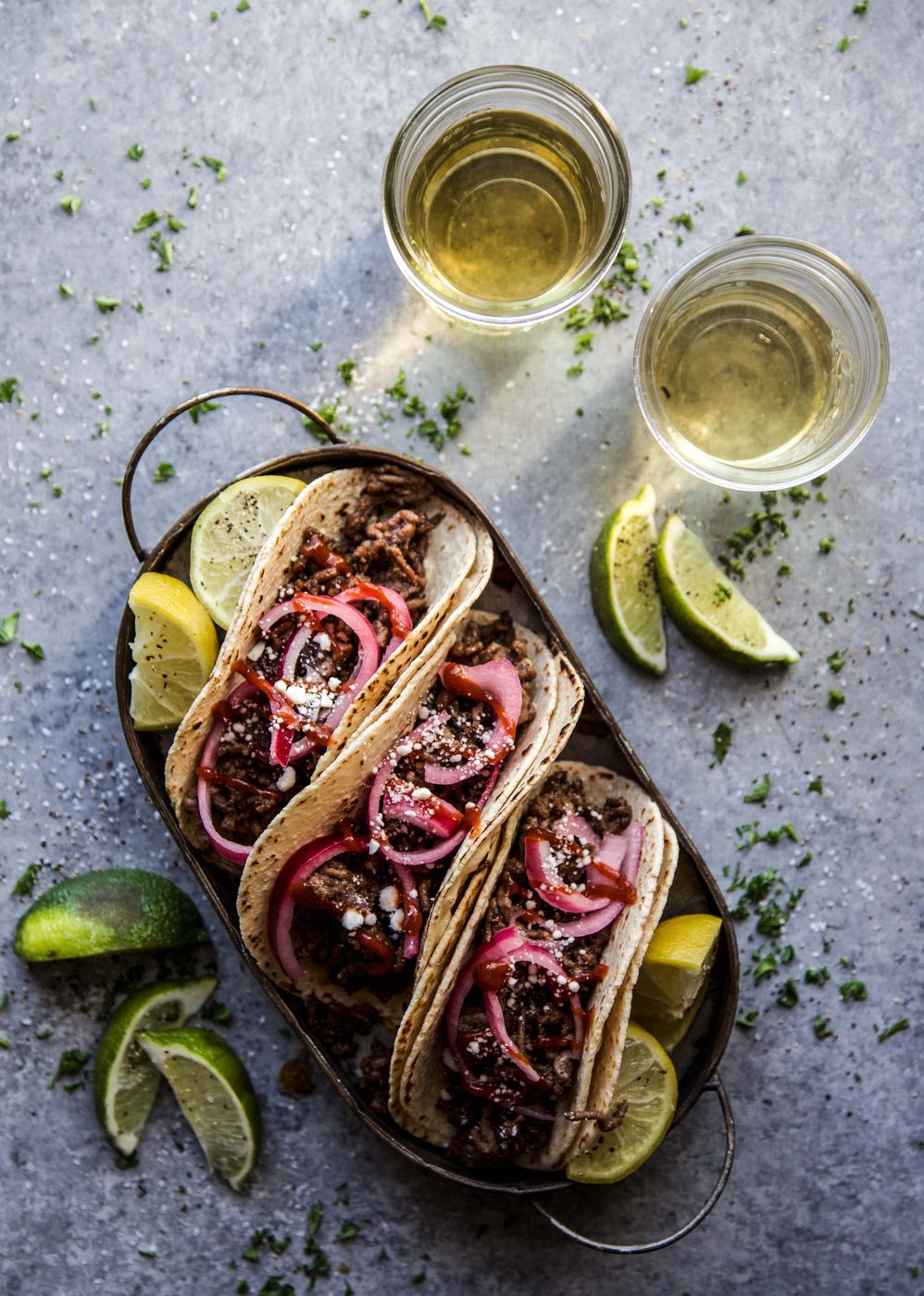 Sesame Beef Tacos with Speedy Pickled Onions on a plate