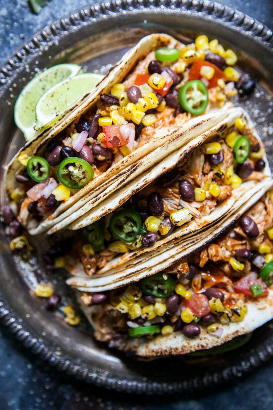 Slow Cooker BBQ Chicken Tacos, finished with Texas Caviar