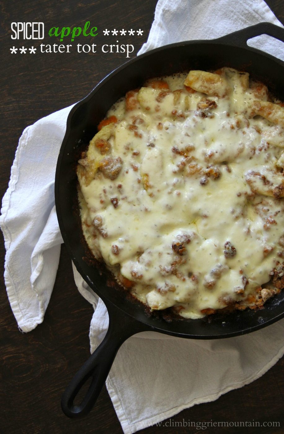Honey whipped cream on spiced apple tater tot crisp