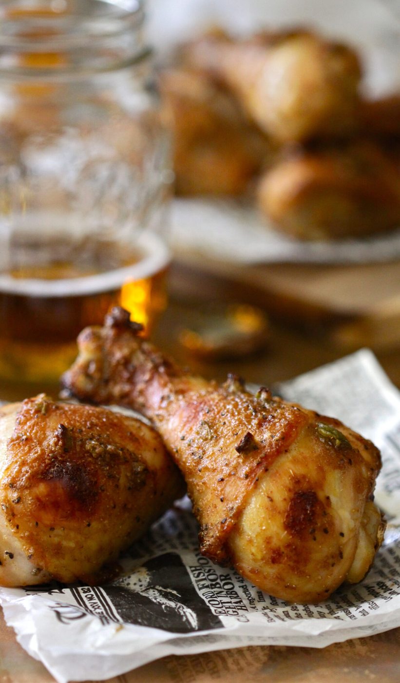 Brown sugar and jalapeños on spiced chicken drumsticks
