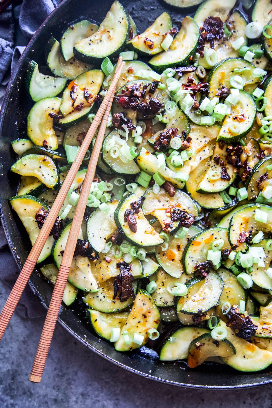 spiced zucchini with chili crisp www.thecurioiusplate.com