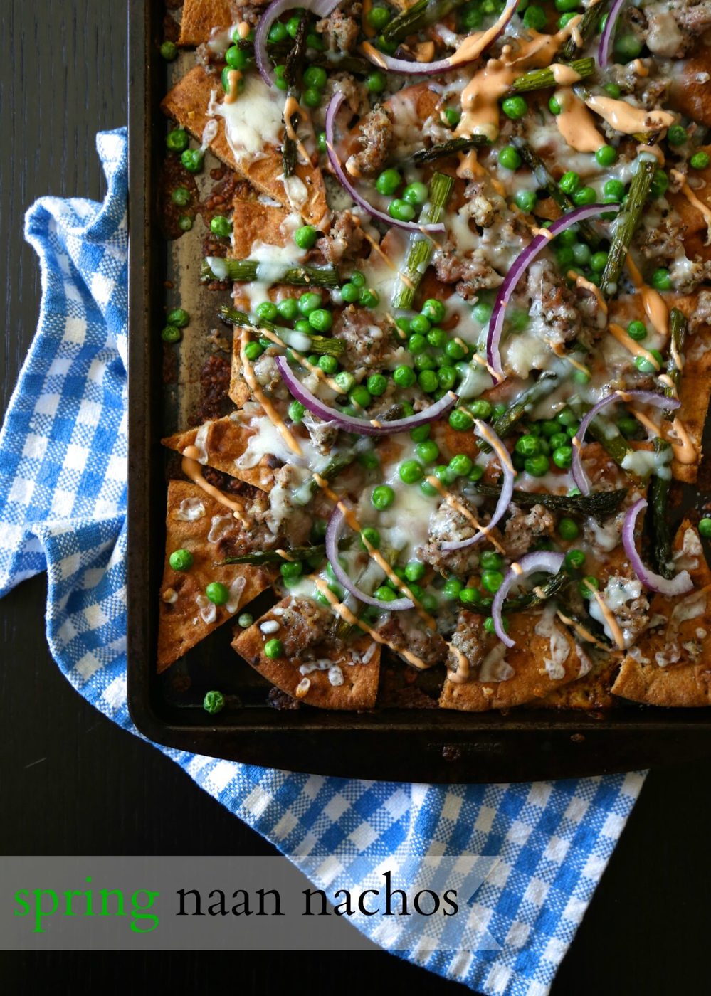 Smoky chipotle dressing on spring naan nachos