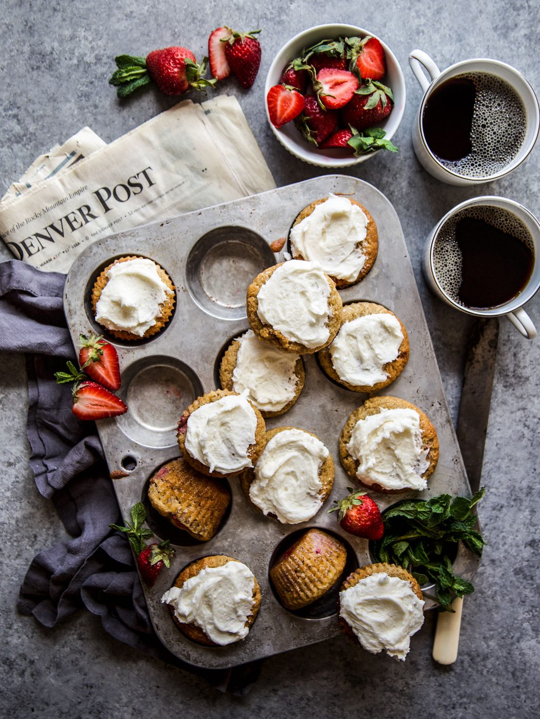 Vanilla Frosting on strawberry Banana Bread Muffins