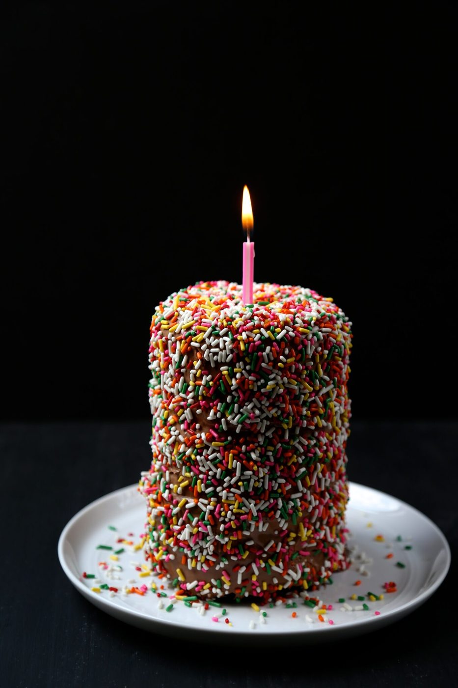 Chocolate marshmallow frosting & sprinkles on three tiered double chocolate mini cake