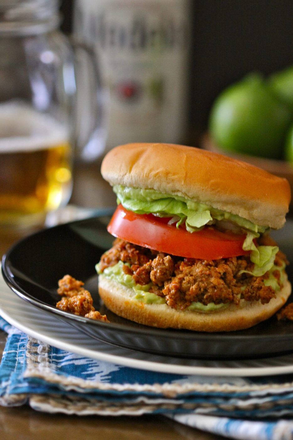 Turkey taco burger, finished with avocado crema