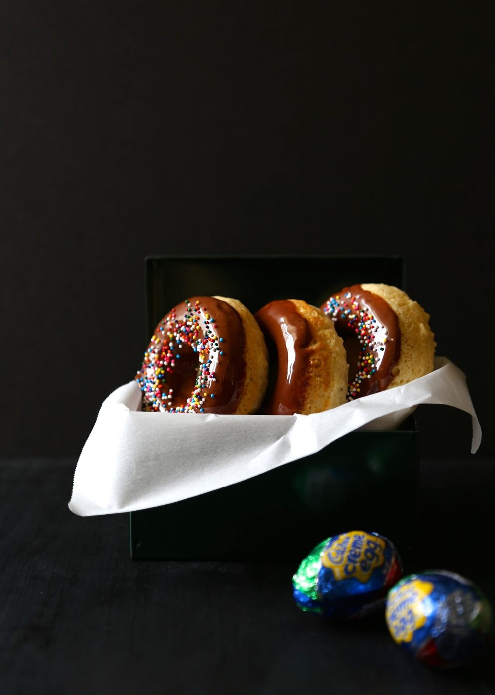 Vanilla baked doughnuts, finished with cadbury ganache icing