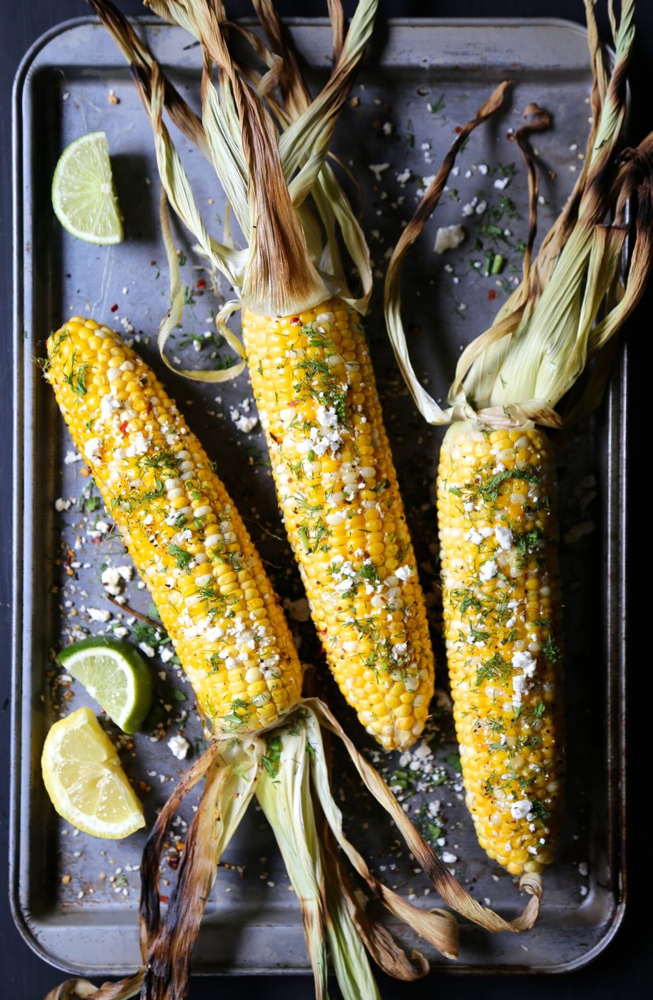 Fresh dill on grilled shawarma corn