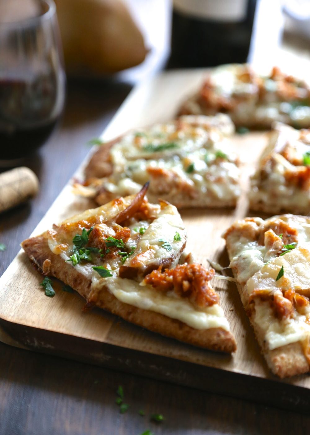 White chicken naan pizza, finished with sauteed pears & gorgonzola