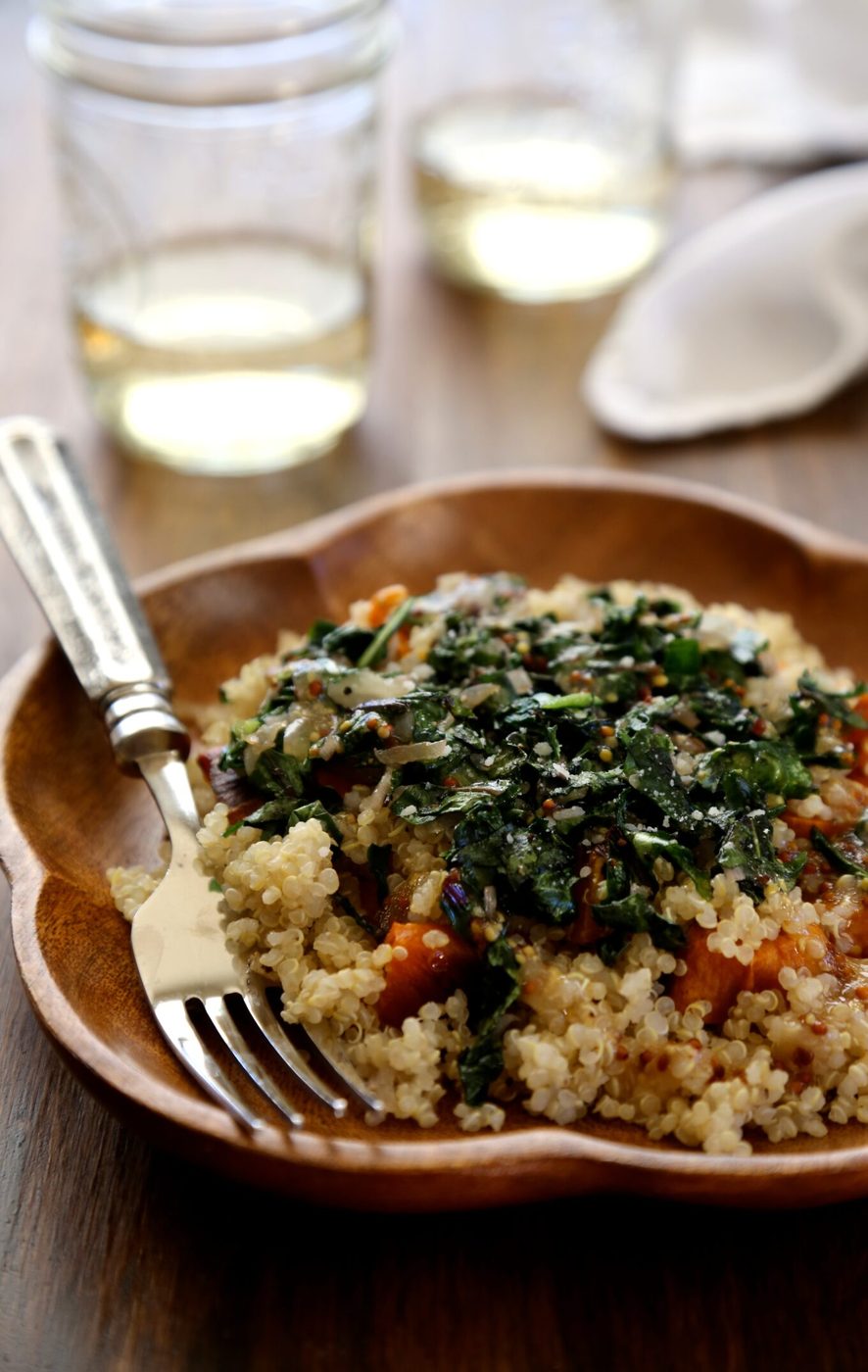 Quinoa, dandelion greens, & whole grain mustard vinaigrette on winter squash salad
