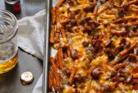 Smothered Sweet Potato Fries with Andouille Gravy and Pimento Cheese