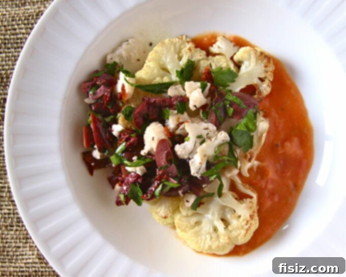 Pan-Roasted Cauliflower Steaks Perfectly pan-roasted cauliflower steaks on a plate