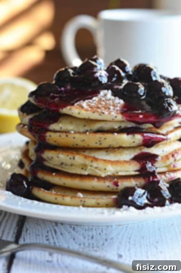 10 Delicious Mother's Day Brunch Recipes 7 Light Lemon Ricotta Poppy Seed Pancakes with homemade Blueberry Sauce, perfect for a special brunch