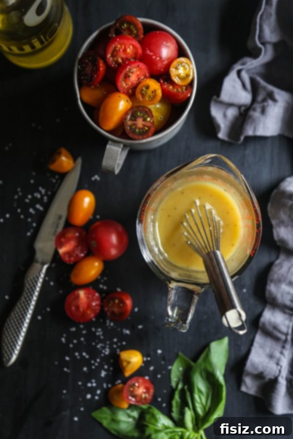 Fresh burrata cheese and ripe tomatoes in a Caprese BLT Bowl