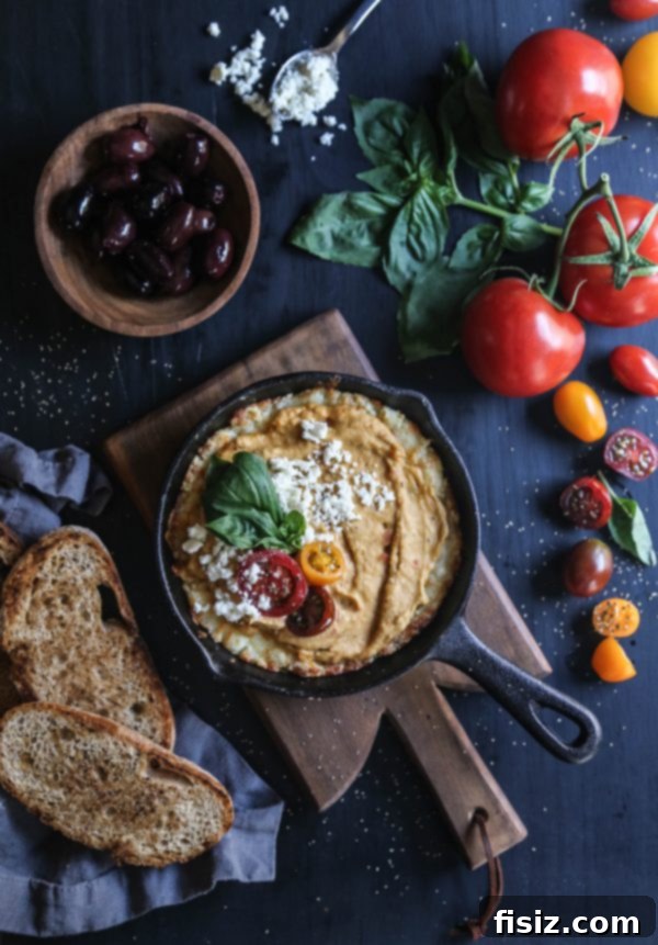Creamy Four Cheese Greek Pizza Dip with Tuscan Herb Hummus 2 Four Cheese Greek Pizza Dip with Tuscan Herb Hummus - an easy appetizer